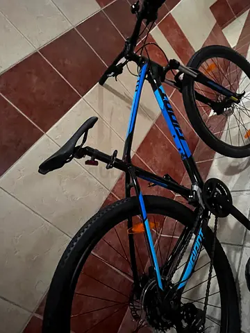 Used Giant Mountain Bike - 26.5Wheel, Blue/Black, perfect Condition used with giant pump and helmet