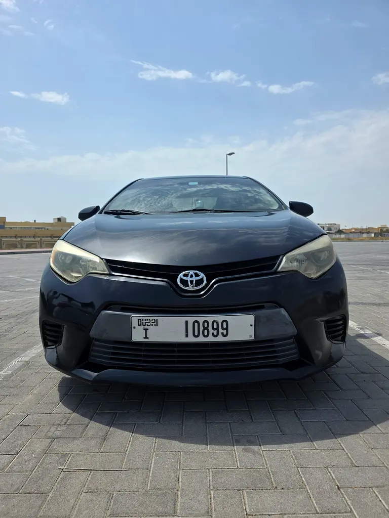 Toyota Corolla 2014 — photo 1 of 13