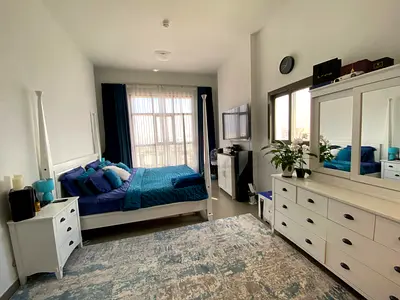 White bedroom furniture set with dresser, bed and nightstands