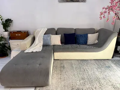 L-shaped grey fabric sectional sofa with chaise, sofa cum bed, very good condition, decently used.