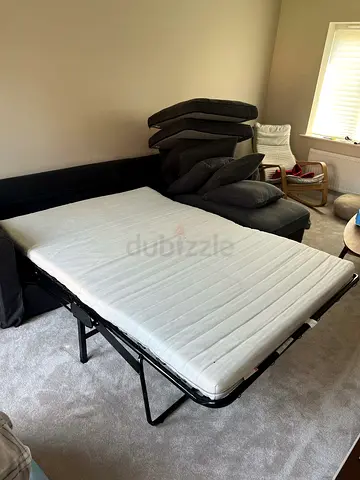 Comfortable fold-out sofa bed with mattress — good condition