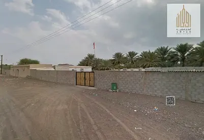Residential/Commercial Land for Sale in Manama, Block 14, on Two Streets and a Main Street. Price includes fees.