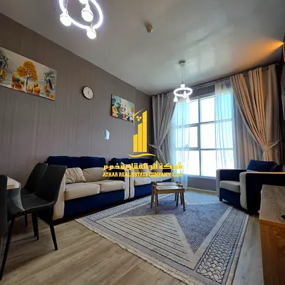 With an open view, a furnished one-bedroom apartment for monthly rent in Ajman, Khalifa Street, City Towers ✔️ Includes bills, internet, and parking