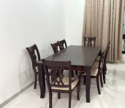 Wooden 8-Seater Dining Table with Cushioned Chairs