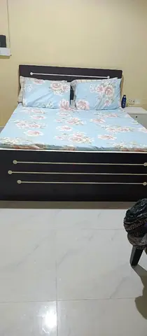 Queen size bed frame with headboard and madicated mattress - good condition