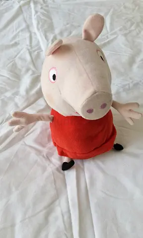 Peppa Pig and Barney plush toys