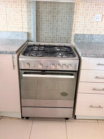 Stainless Steel 4-Burner Gas Cooker with Oven - Good Condition