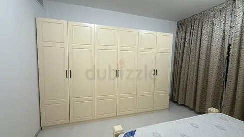Large 6-Door Cream Wardrobe in Good Condition
