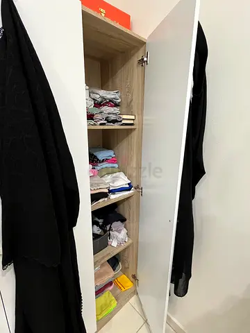 White wardrobe/storage cabinet with divided compartments - good condition