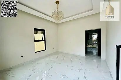 Villa for sale in Al Helio 2, a prime location near amenities within a residential complex, close to Mohammed Bin Zayed Road and Sheikh Zayed Road. Al