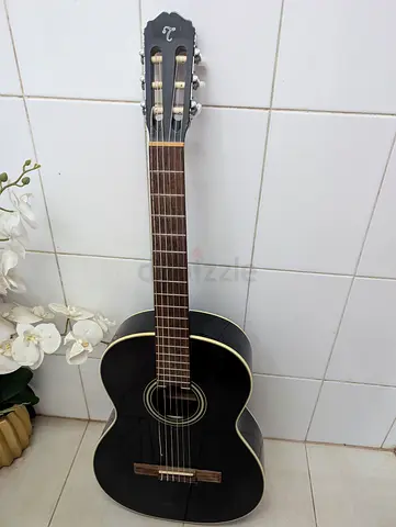 Takamine GC2-BLK classical acoustic guitar in a high-gloss black finish
