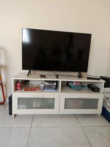 42-50 inch LED TV with white TV stand - good working condition
