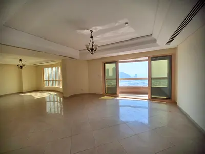 3-bedroom apartment with a living room for annual rent in Al Majaz 3, Sharjah. Large living room, maid's room, built-in wardrobes, open sea view, high