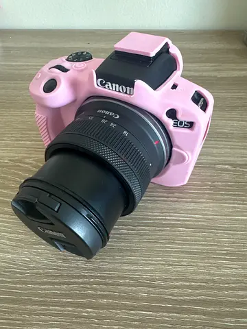 Canon EOS r50 Mirrorless Camera with Pink Silicone Case and 18-150mm Lens