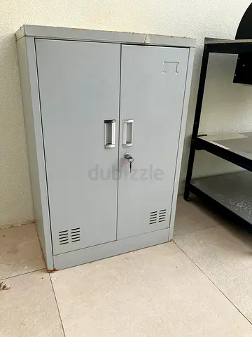 Metal storage cabinet with lock — compact office locker