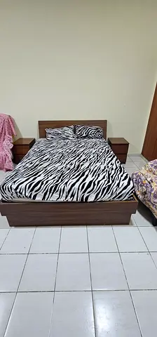 Queen size bed (160×200cm) with 2 night stand, beneath storage. With mattress, 275 AED