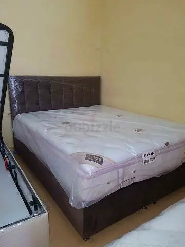 Queen size upholstered bed frame with mattress - good condition