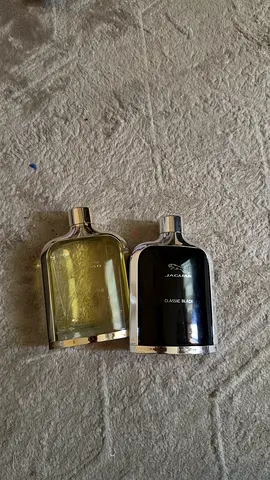 Two Jaguar mens fragrances — Classic Black and classic gold