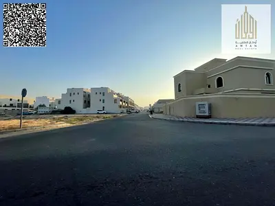 For sale: Residential investment land for villas in Ajman, Al Helio 2 area, Al Helio Center 1 project. The land area is 292 square meters / 3150 squar