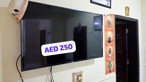 43 LED Smart TV - Wall Mounted, Good Working Condition (AED 250)