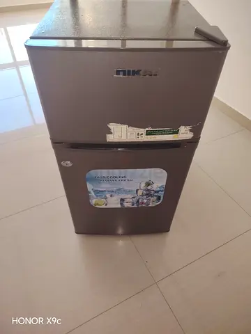 Mini refrigerator new condition
