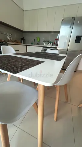 Ikea-style white dining table with 4 chairs - modern Scandinavian set