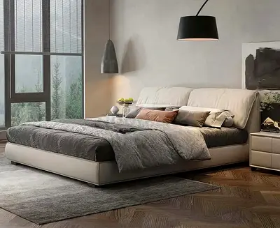 Modern low-profile upholstered king bed with padded headboard - beige