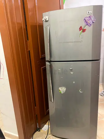 Used Silver Double-Door Refrigerator - Good Working Condition
