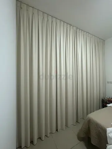 Full-length beige blackout curtains - set of panels