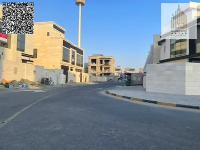 Corner plot for sale in Al Helio Center 1, very close to the main road, ready for immediate constru