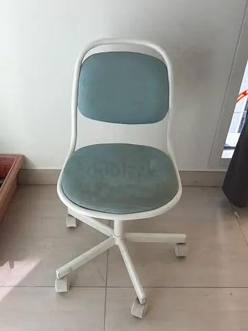 White swivel chair with blue fabric seat and back — good condition