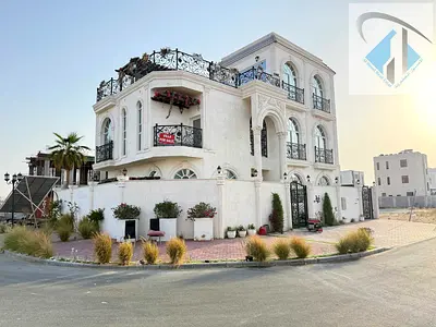 Luxury corner villa in Al Bahia, classic style, 5 bedrooms, swimming pool, rooftop, modern finishing, at a special price.