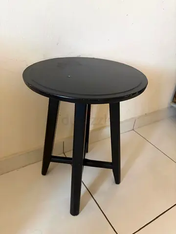 Small round black wooden stool - sturdy side table