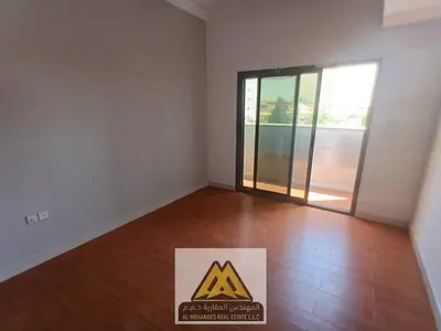 Ultra Spacious 1BR Family Apartment For Rent In Al Nuaimiya 1 Ajman Layout Featuring Master Bedroom, 2 Bathrooms, Private Balcony & Central AC Massive