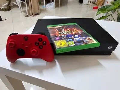 Xbox One X 1 TB console with wireless controller and game - good working condition with Games