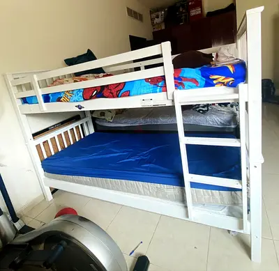 White wooden bunk bed (twin over full) in good condition