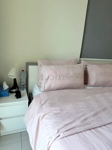Bed with side tables