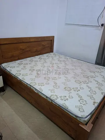 Double bed with medicated mattress