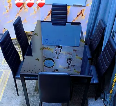 Black glass dining table with 6 leather chairs - modern set