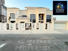 Luxury villa with custom finishing, swimming pool, elevator, and terrace in Al Zahia area, Ajman. I