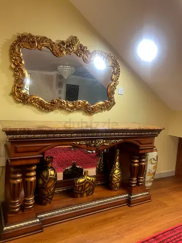 Classic console with marble top and gold mirror