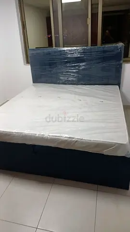 Queen storage bed with mattress - barely used, wrapped