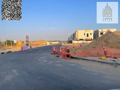 Land for sale, ready for immediate construction at a special price. Residential/investment villas for sale in Al Helio 2 Ajman. The land is 160 squa