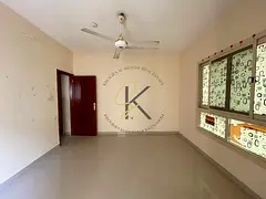🏢🌿🚗 Spacious Unfurnished 2BHK with Balcony & Dedicated Parking for Rent in Muwailah Com