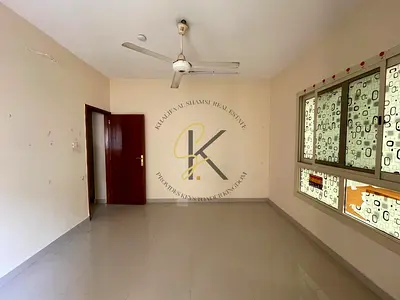 🏢🌿🚗 Spacious Unfurnished 2BHK with Balcony & Dedicated Parking for Rent in Muwailah Commercial,