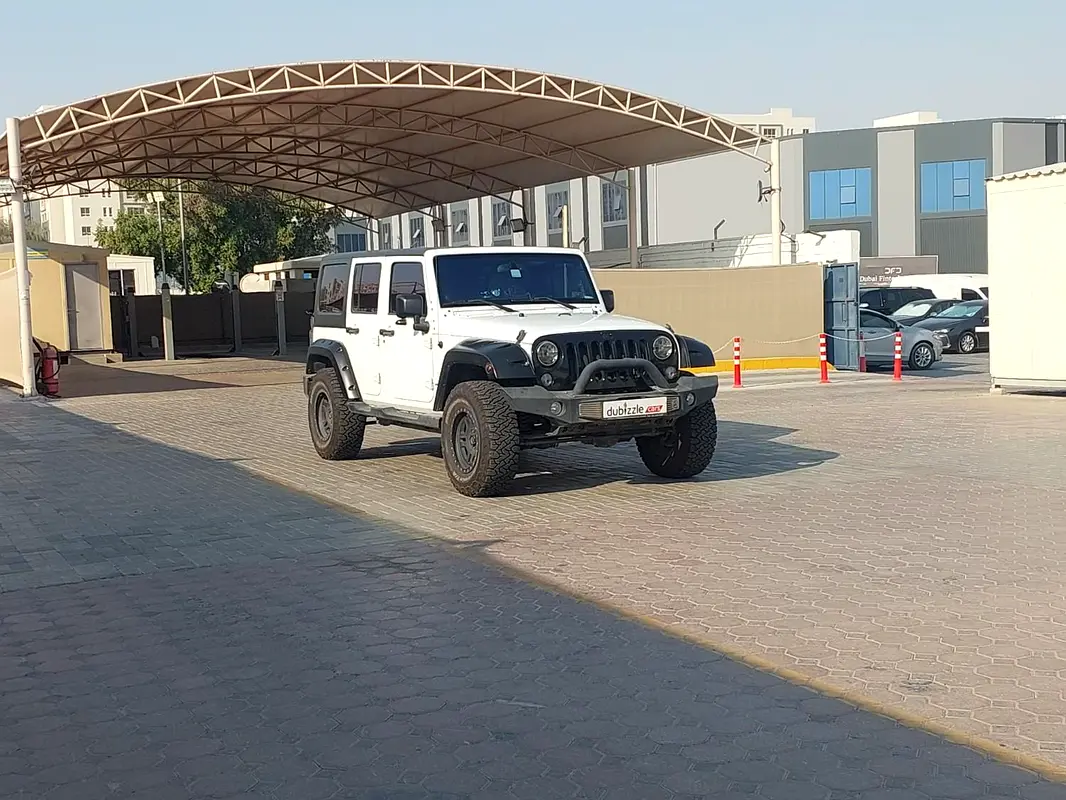 Jeep Wrangler 2014 — photo 1 of 13
