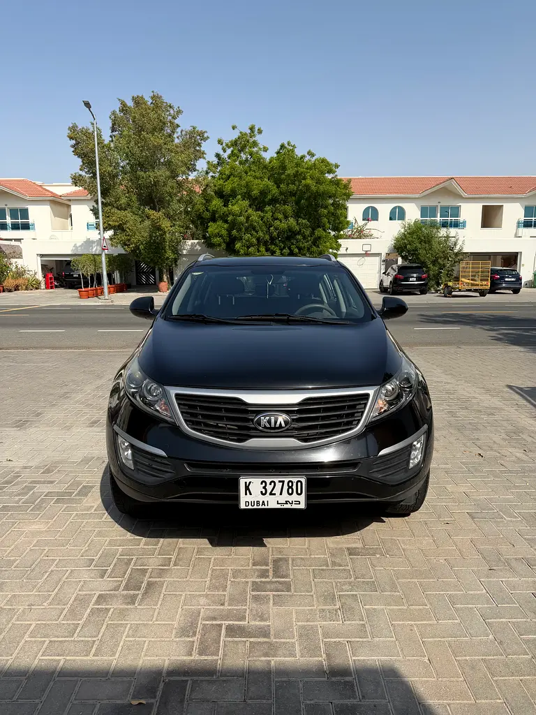 Kia Sportage 2013 — photo 1 of 8