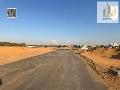 Residential and commercial land in Al Amerah, second block from the main street, opposite the Data Center and Azhi Complex. Freehold for all