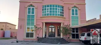 Two-storey villa for rent in Ajman, Al Raqayeb area 5 rooms, a living room, a hall, and a maid's