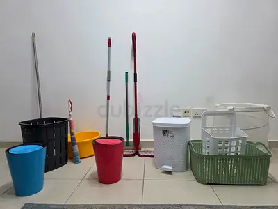 Household cleaning and storage set — baskets, bins, mops, and waste bin (used)